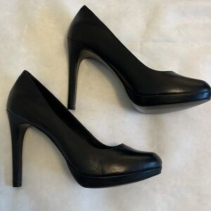 BCBG black leather platform heel. Size 7